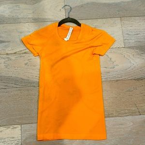 LULULEMON SIZE 2 SWIFTLY TECH SHORT SLEEVE SHIRT-worn twice, in great condition!